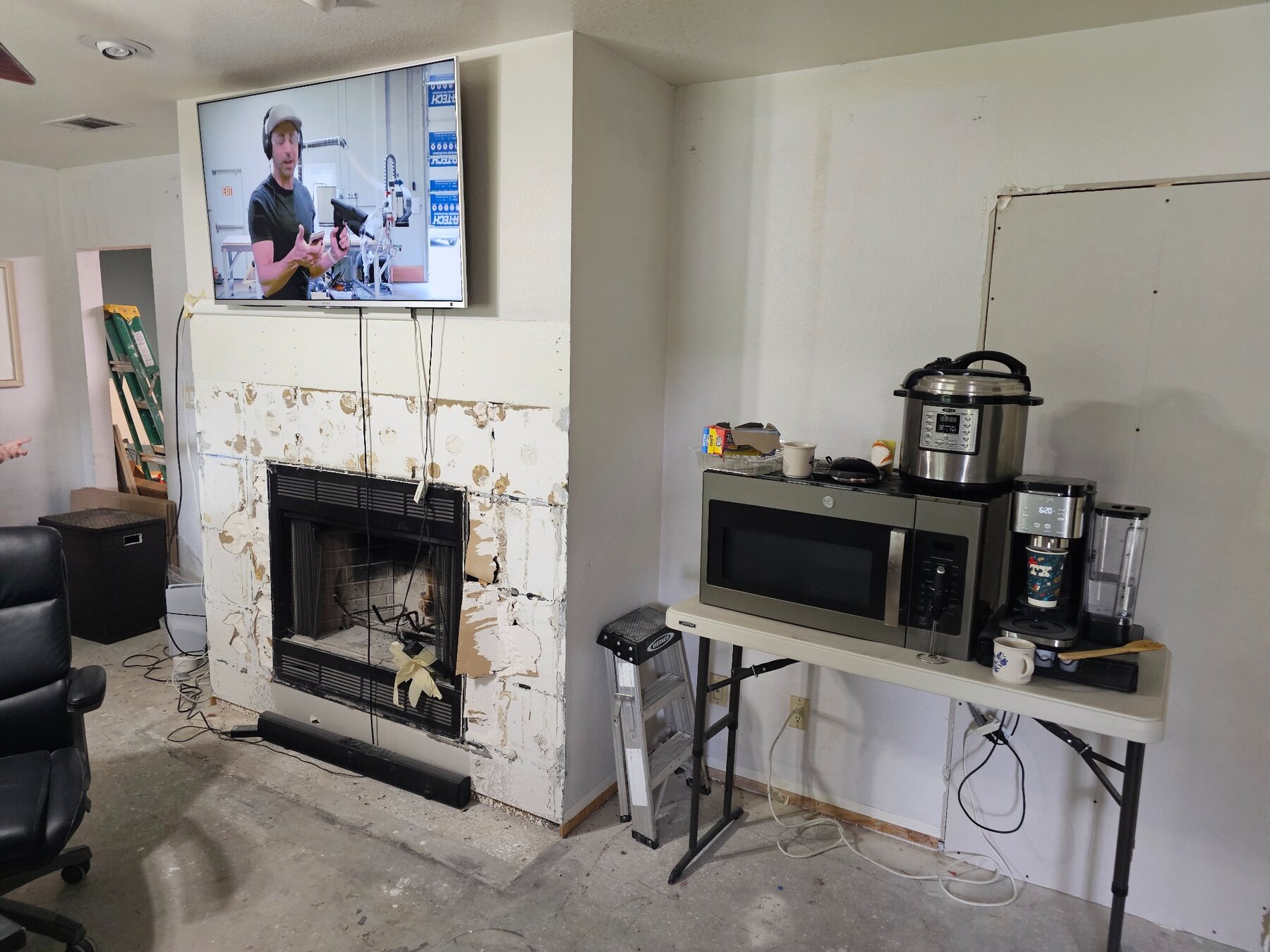 Existing fireplace wall before custom built-ins