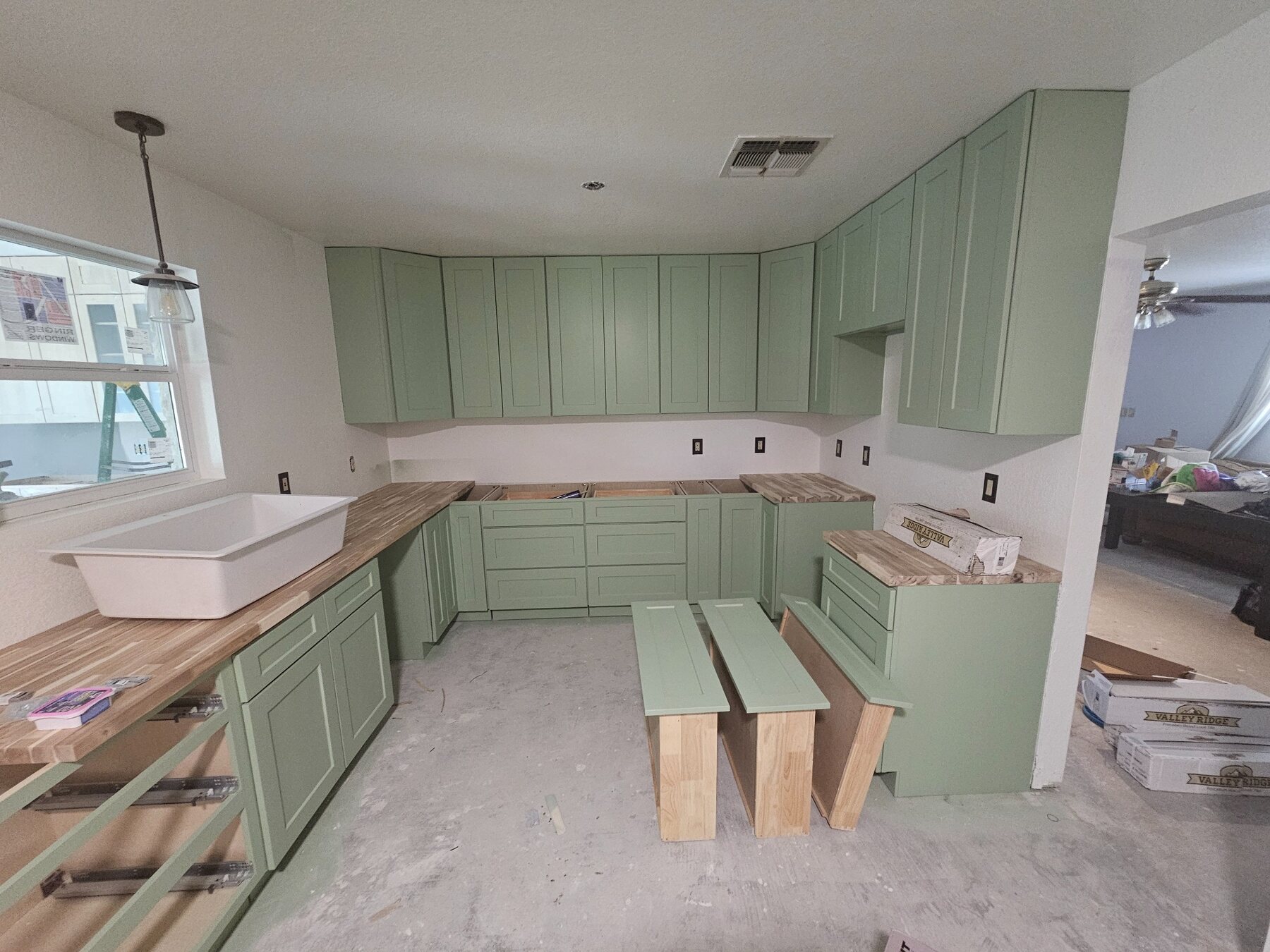 New kitchen cabinets being installed