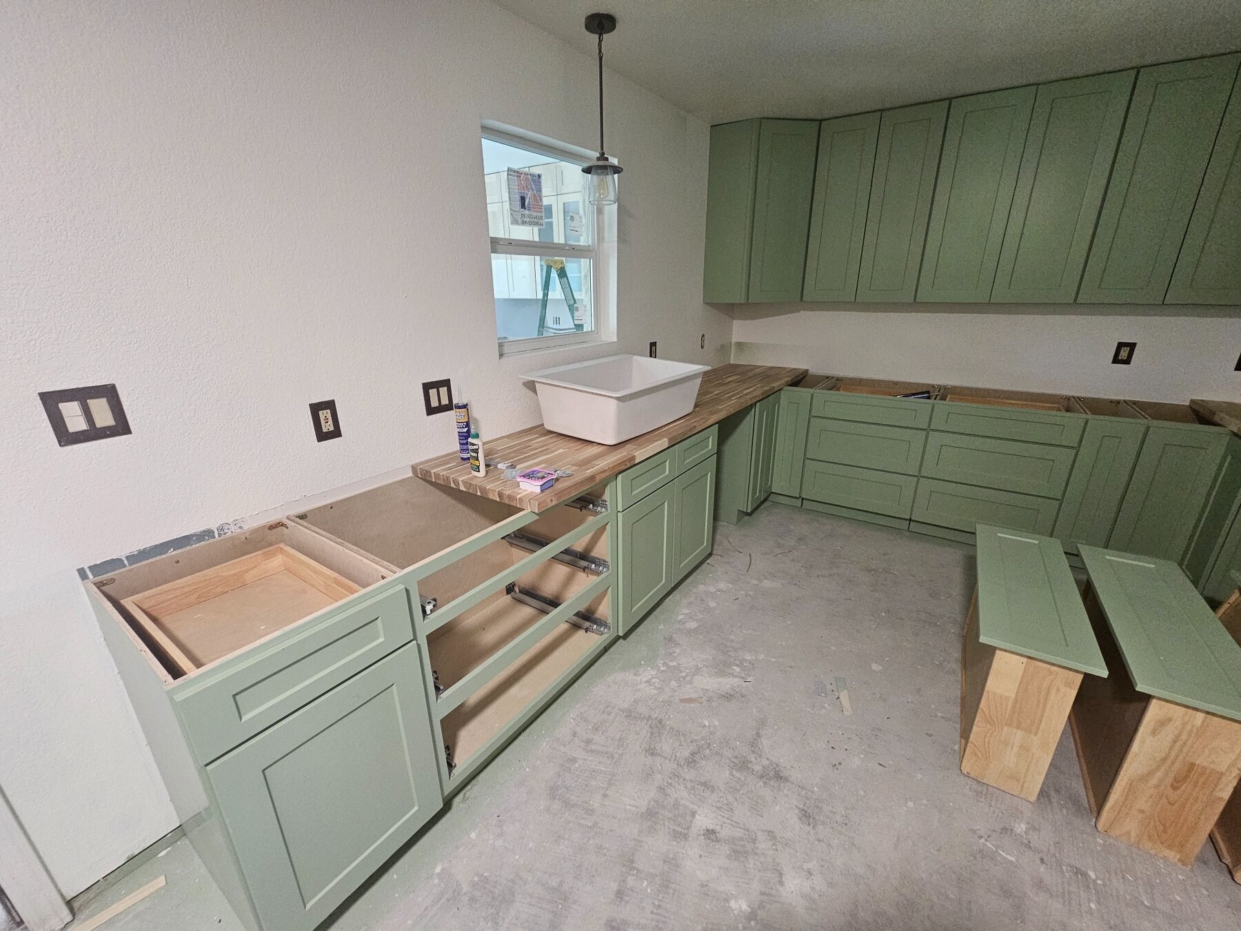 Kitchen remodel in progress with new cabinet layout